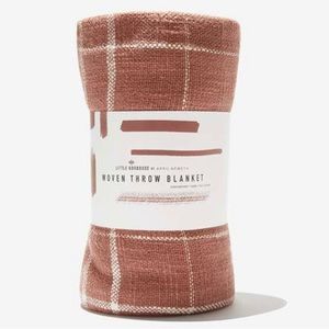 Little Korboose woven throw blanket. In original plastic